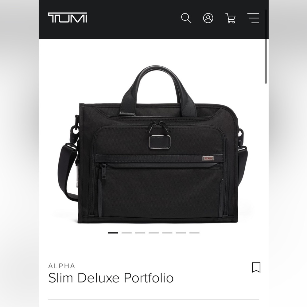 Like new used twice Tumi slim delux portfolio briefcase in black